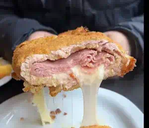 Milanesa gigante con queso y jamón